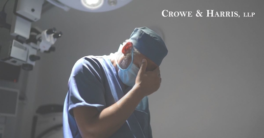 a sad looking surgeon