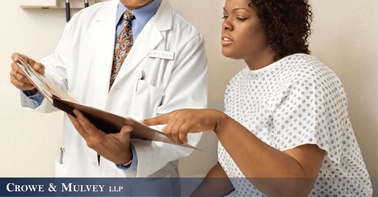 woman talking with her doctor