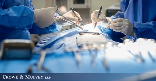 doctors performing surgery