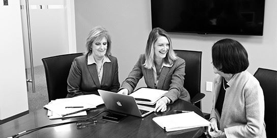 group of lawyers discussing a case